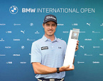 BMW International Open. Первая победа южноафриканца Майкла Холлика 
